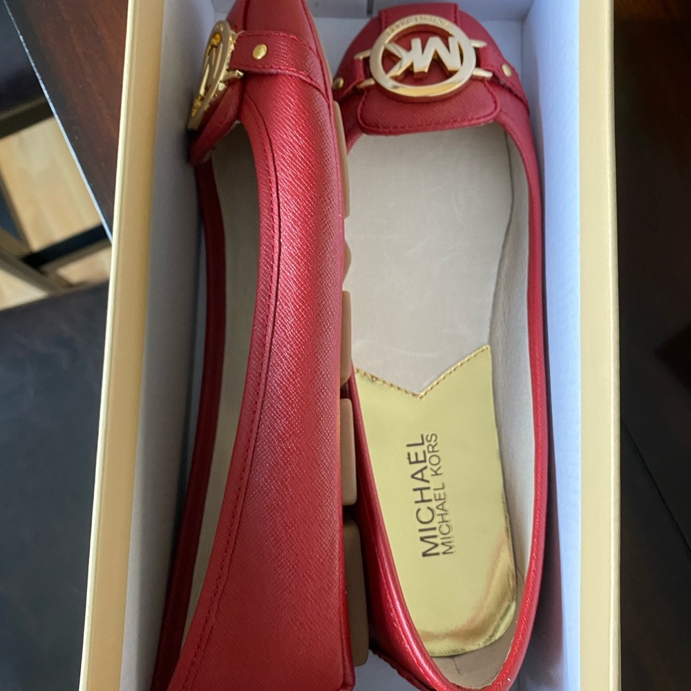 Never worn red Michael Kors flats